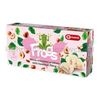 Carletti żaby w białej czekoladzie z nadzieniem z orzechów laskowych 148g